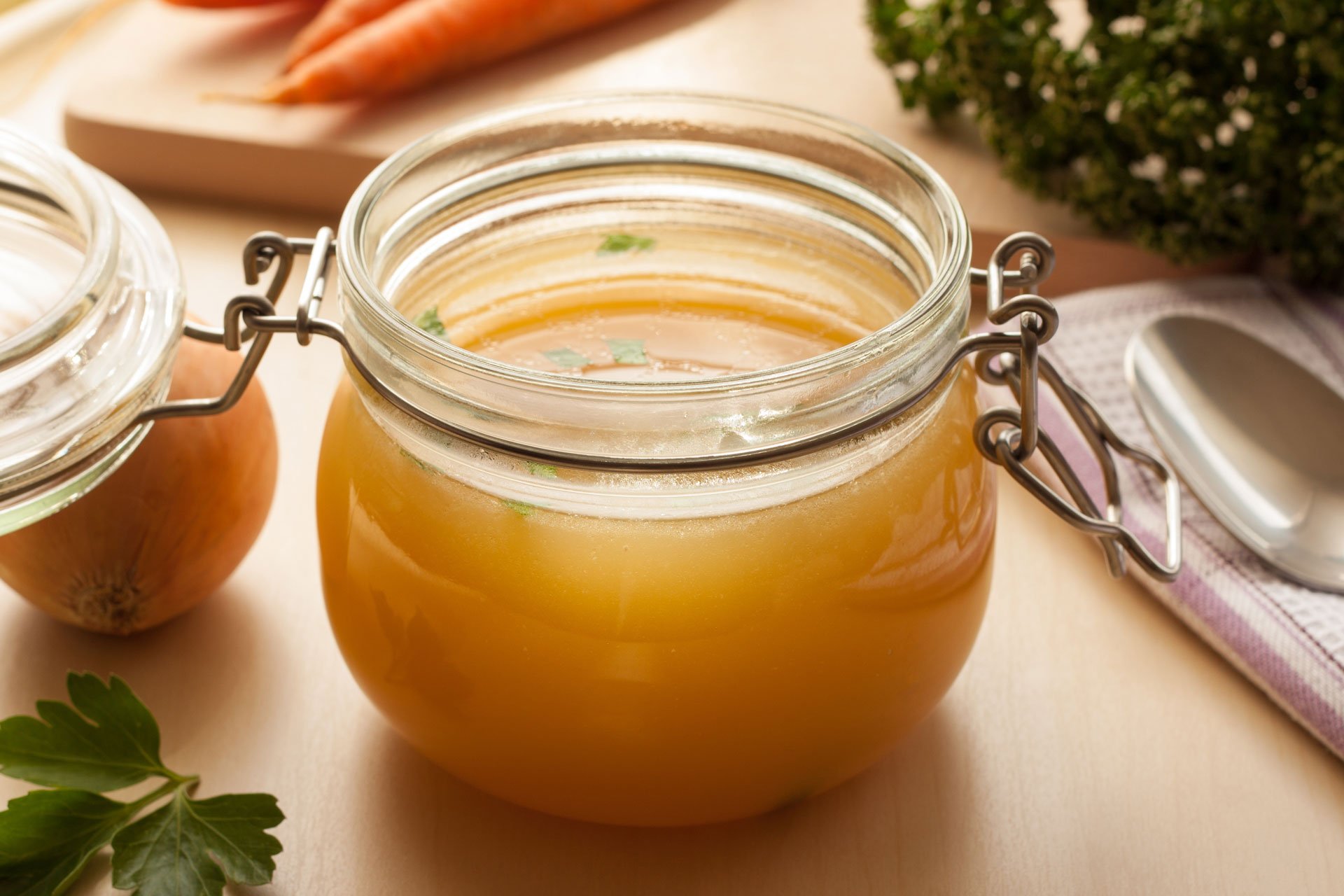 Bone broth made from chicken in a glass jar