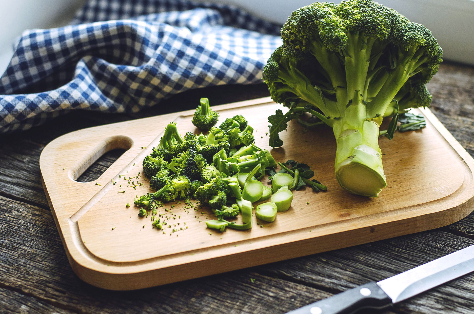 Chopped broccoli on cutting board