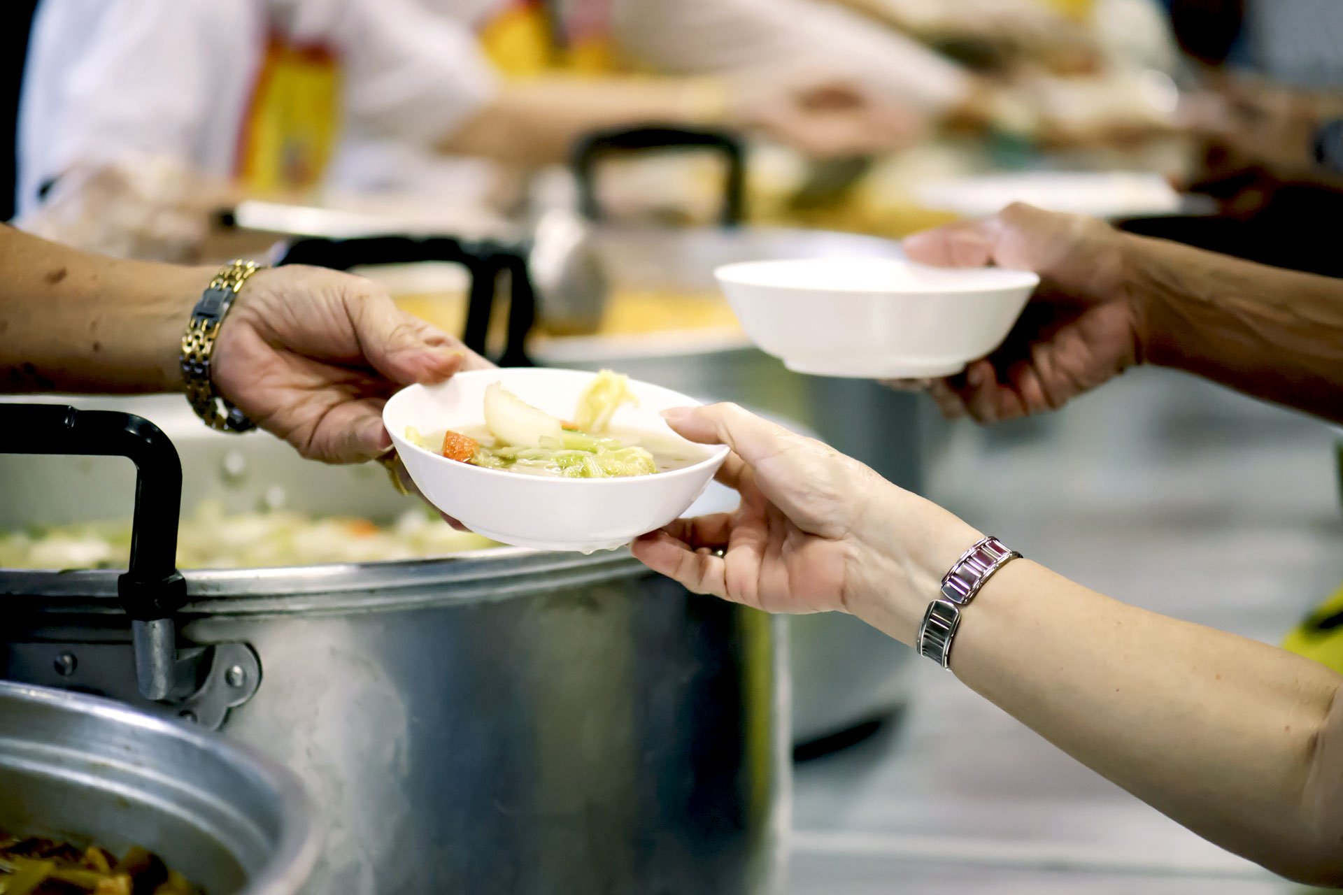 Feeding the hungry at a soup kitchen