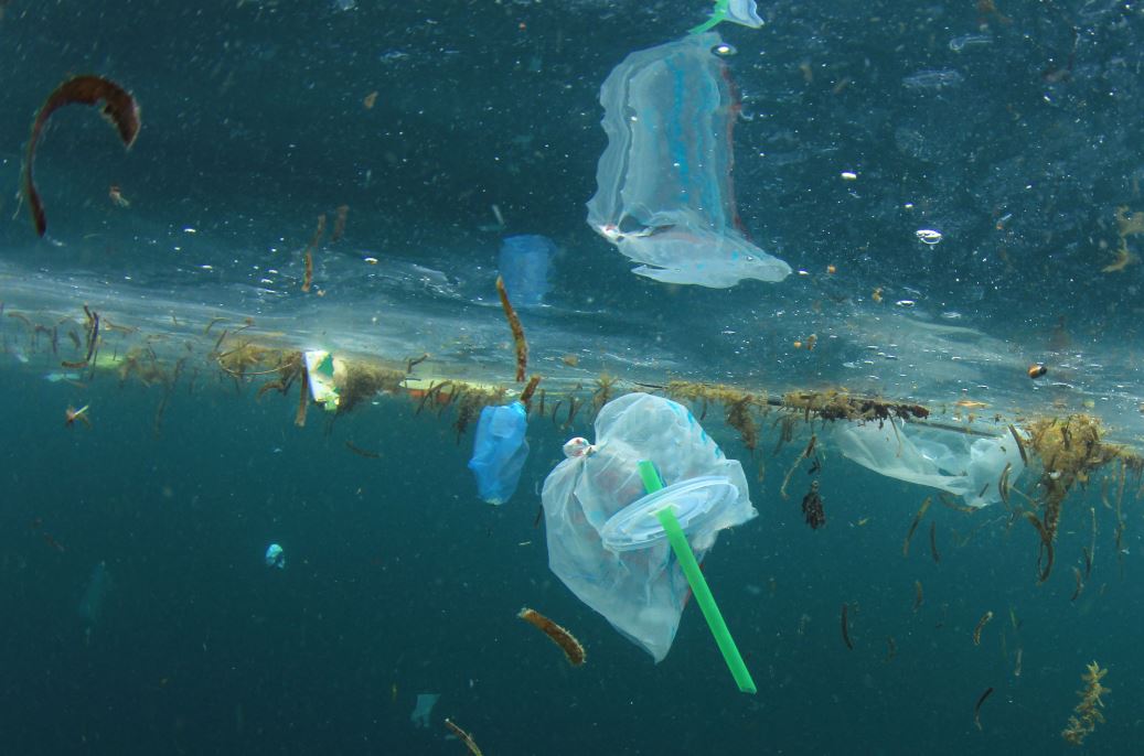 Plastic straws, carrier bags and other garbage pollution in ocean