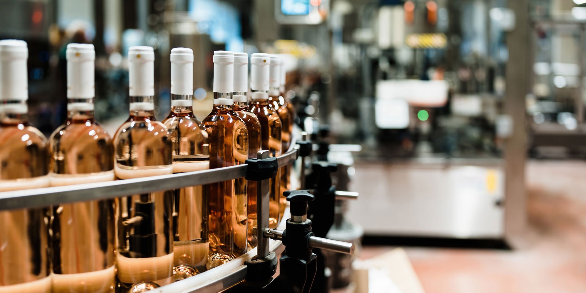 wine bottles being processed
